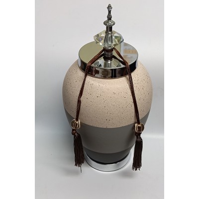 Κεραμικό τζαρ στρόγγυλο ασημί/ζαχαρί/γκρί με μεταλλικό καπάκι με διακοσμητική φούντα 18x18x39εκ.